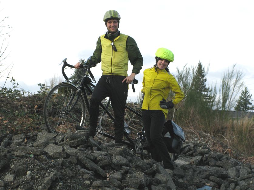 Riley and his stoker pose on some rocks with the tandem